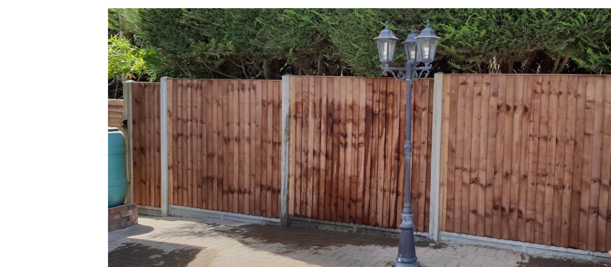 Garden gate fitting by Gardiner Fencing Services